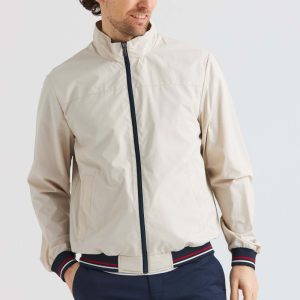 Beige jacka med kontrastdetaljer