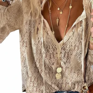 Blus dam, boho — v-ringning och spetsdetaljer i linne